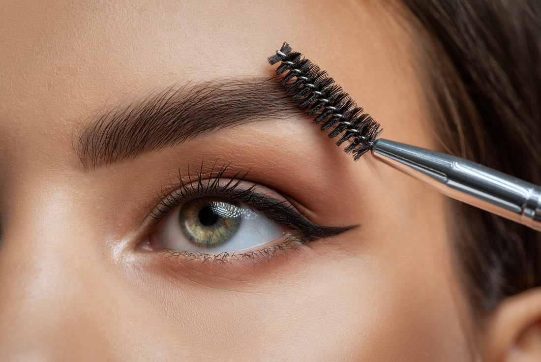 Close-up of freshly tinted and shaped eyebrows with a natural, defined finish at Casa de Coco beauty salon.